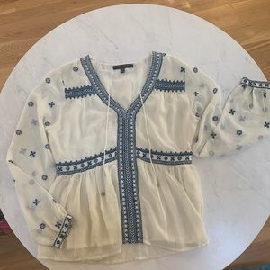 White and blue blouse